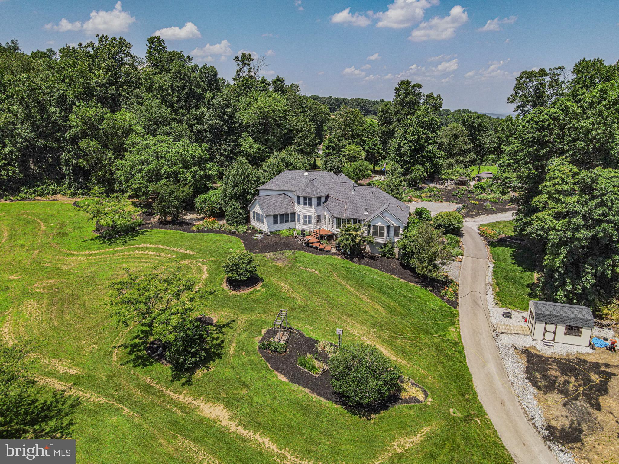 4815 Zeiglers Church Road Spring Grove, PA 17362 - Photo 112 of 122 a aerial view of a house with a garden