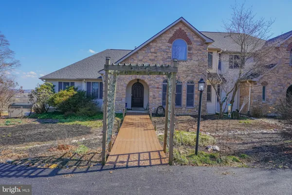 a bedroom with a bed and a desk