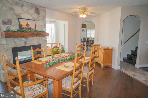 a bathroom with a sink vanity granite tub and shower