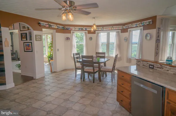 a view of a livingroom with furniture and wooden floor