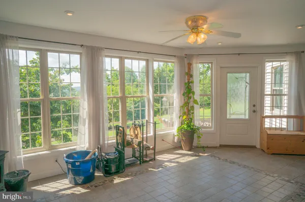 a view of a room that has a window