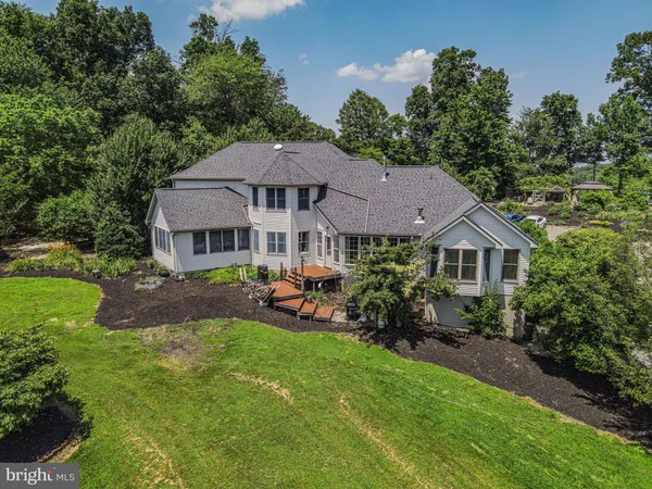 a front view of a house with yard