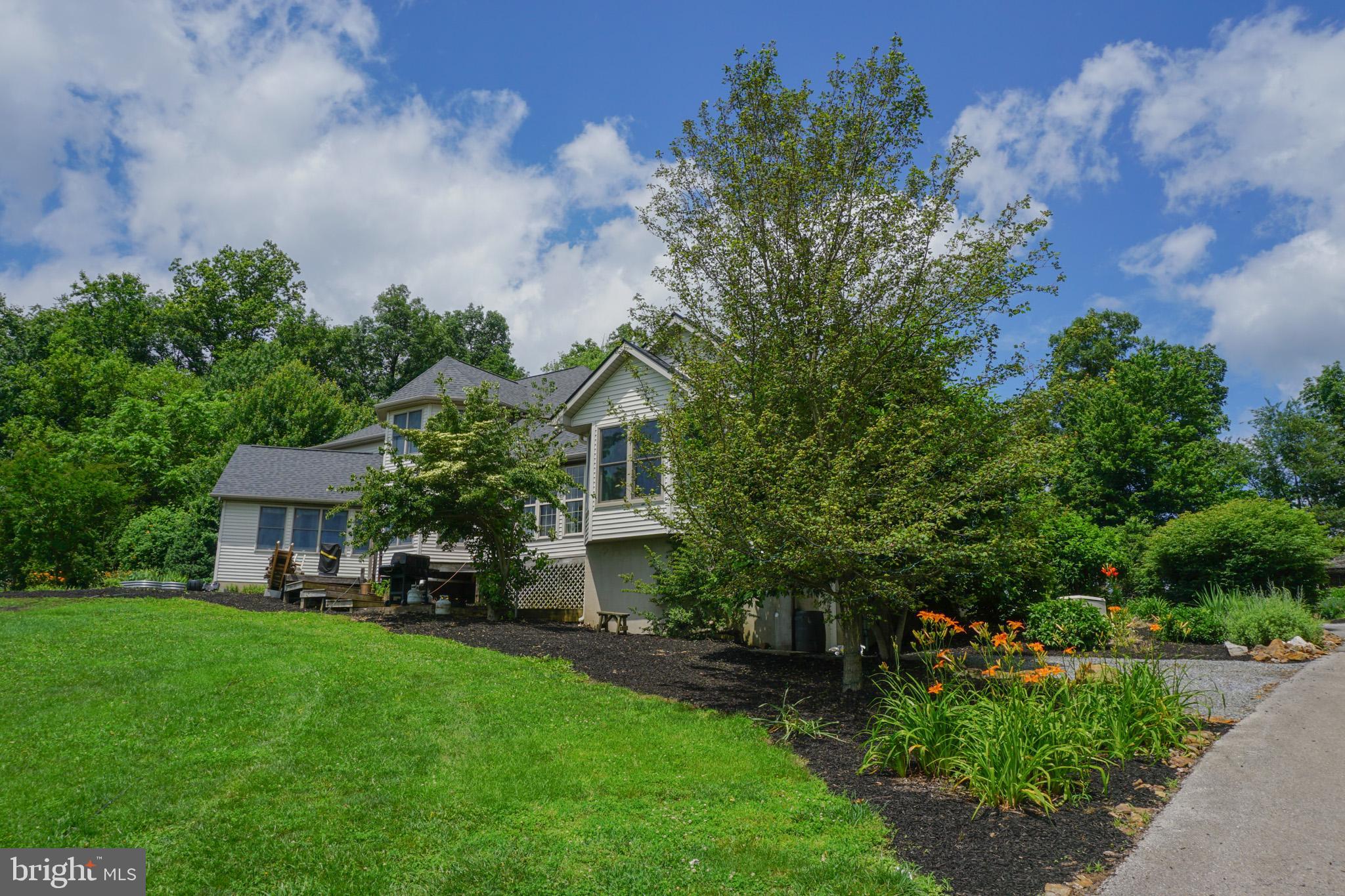 4815 Zeiglers Church Road Spring Grove, PA 17362 - Photo 80 of 122 a front view of a house with garden