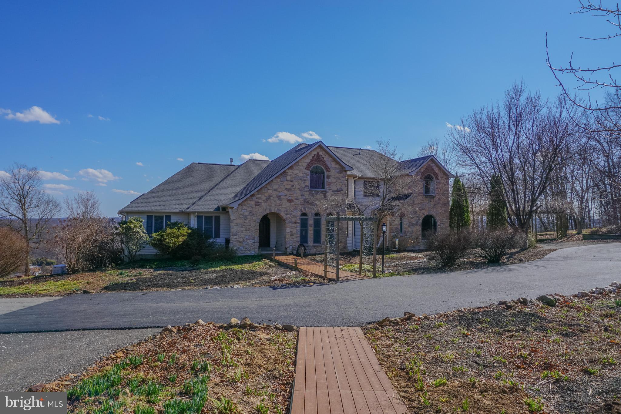 4815 Zeiglers Church Road Spring Grove, PA 17362 - Photo 10 of 122 a front view of a house with a yard