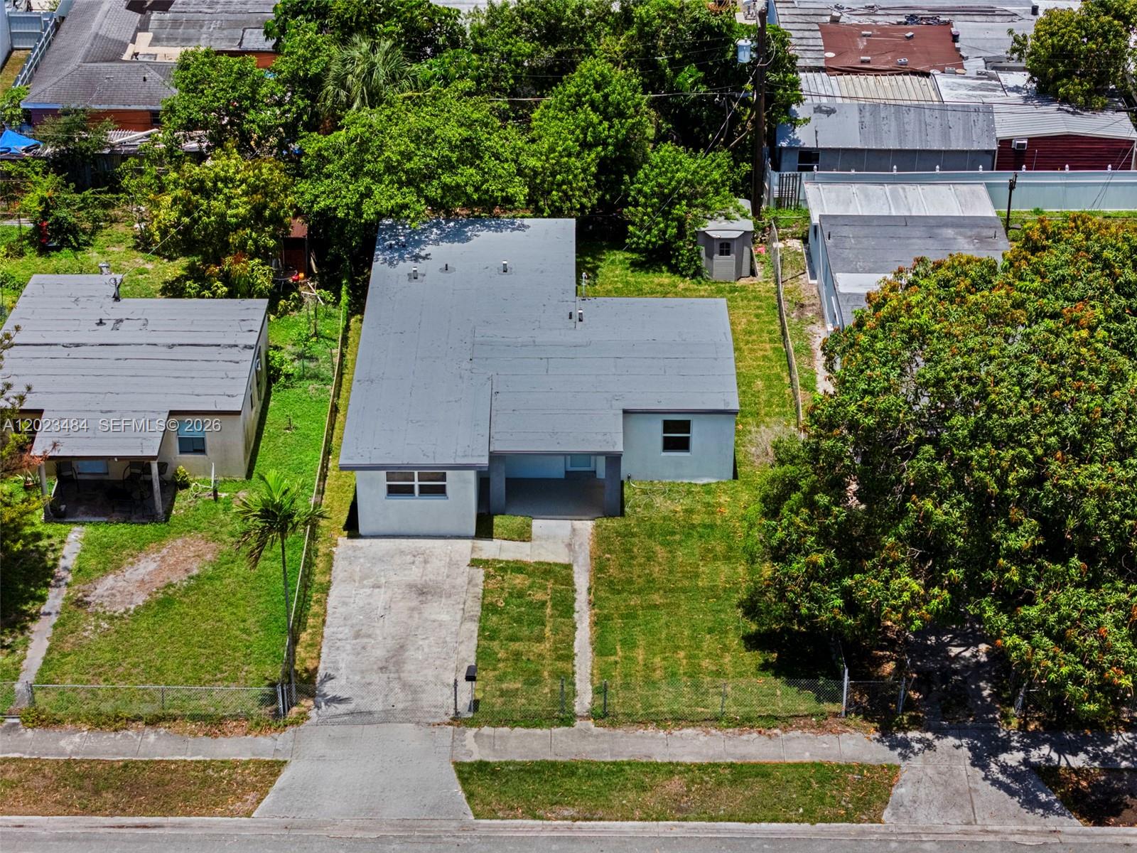 1961 Rutland Street Opa-Locka, FL 33054 - Photo 33 of 33 an aerial view of a house
