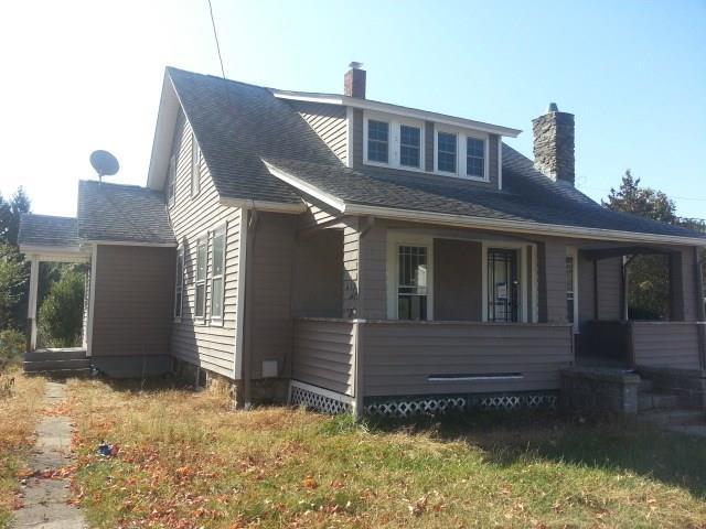 41 Canterbury Road Plainfield, CT 06374 - Photo 1 of 1 a front view of a house with a yard