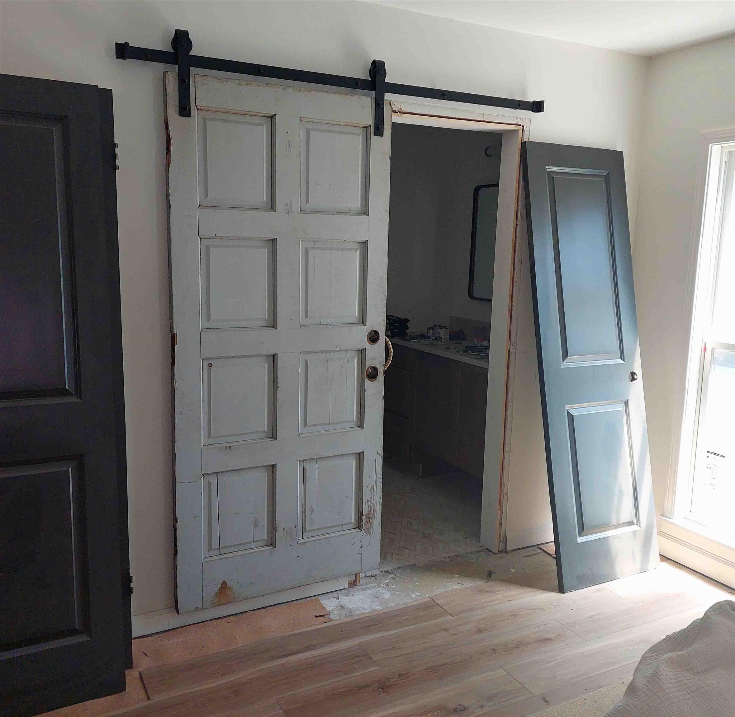 160 Ericson Road Memphis, TN 38018 - Photo 4 of 7 an empty room with wooden floor and windows