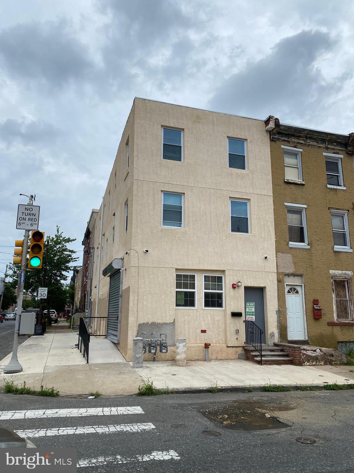 447 Diamond Street, Unit 2 Philadelphia, PA 19122 - Photo 18 of 18 a front view of a building with street view