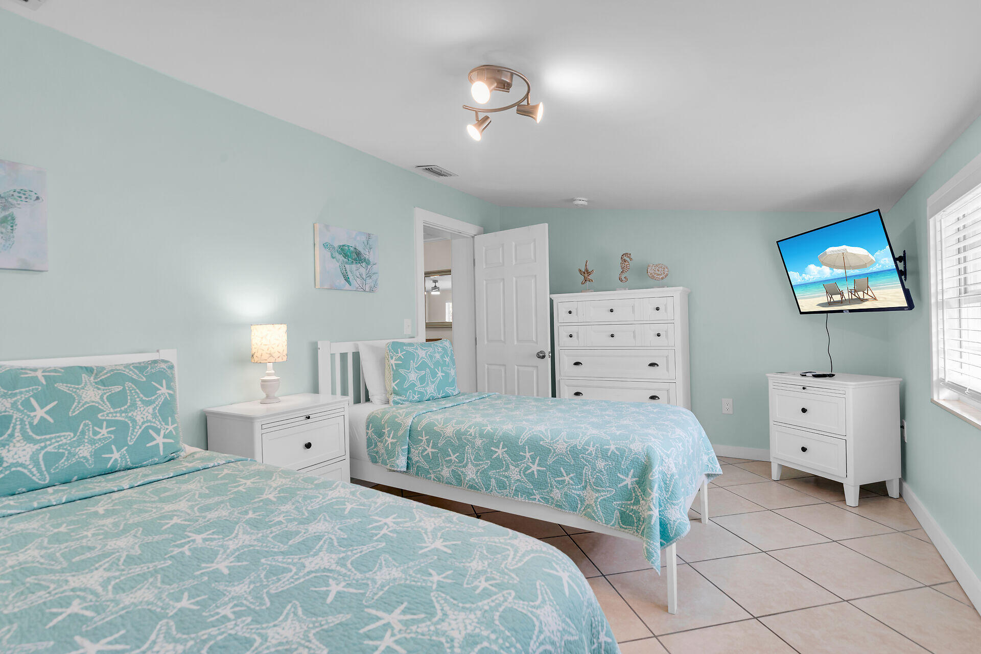1707 George Street Key West, FL 33040 - Photo 20 of 39 a bedroom with a bed and a baby crib