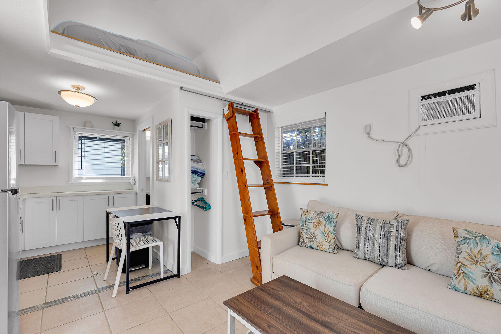 1707 George Street Key West, FL 33040 - Photo 28 of 39 a living room with furniture and a wooden floor