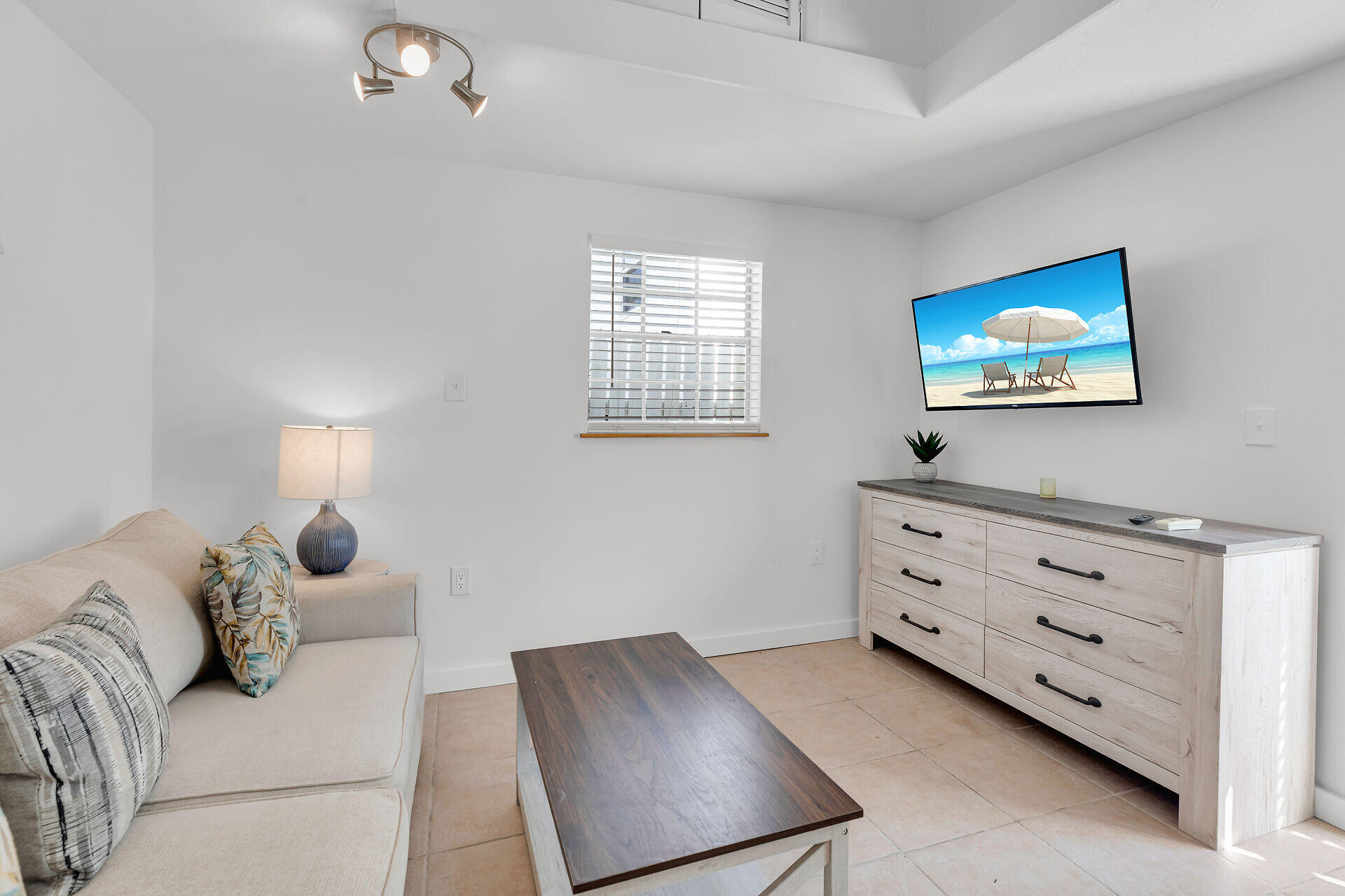 1707 George Street Key West, FL 33040 - Photo 29 of 39 a bedroom with a bed and a window