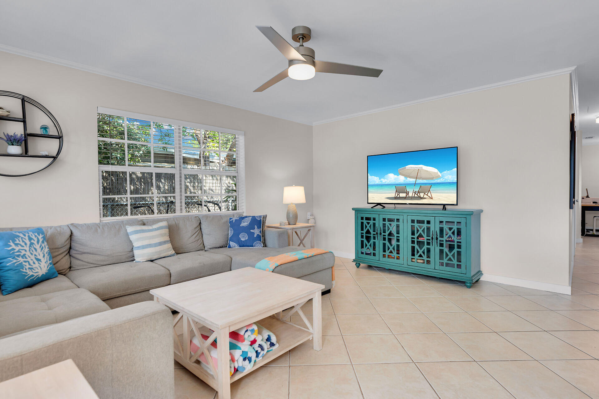 1707 George Street Key West, FL 33040 - Photo 3 of 39 a living room with furniture a large window and a rug