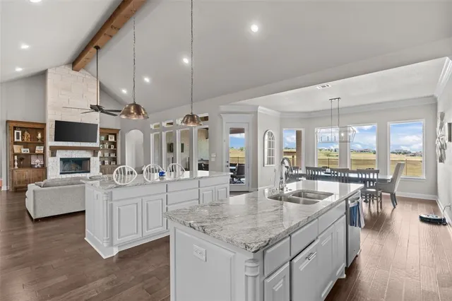 a kitchen with living room and living room