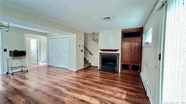 a view of a livingroom with a fireplace