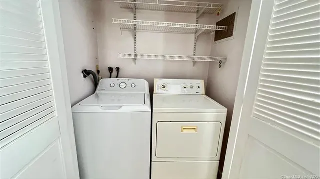 a view of a backyard with potted plants