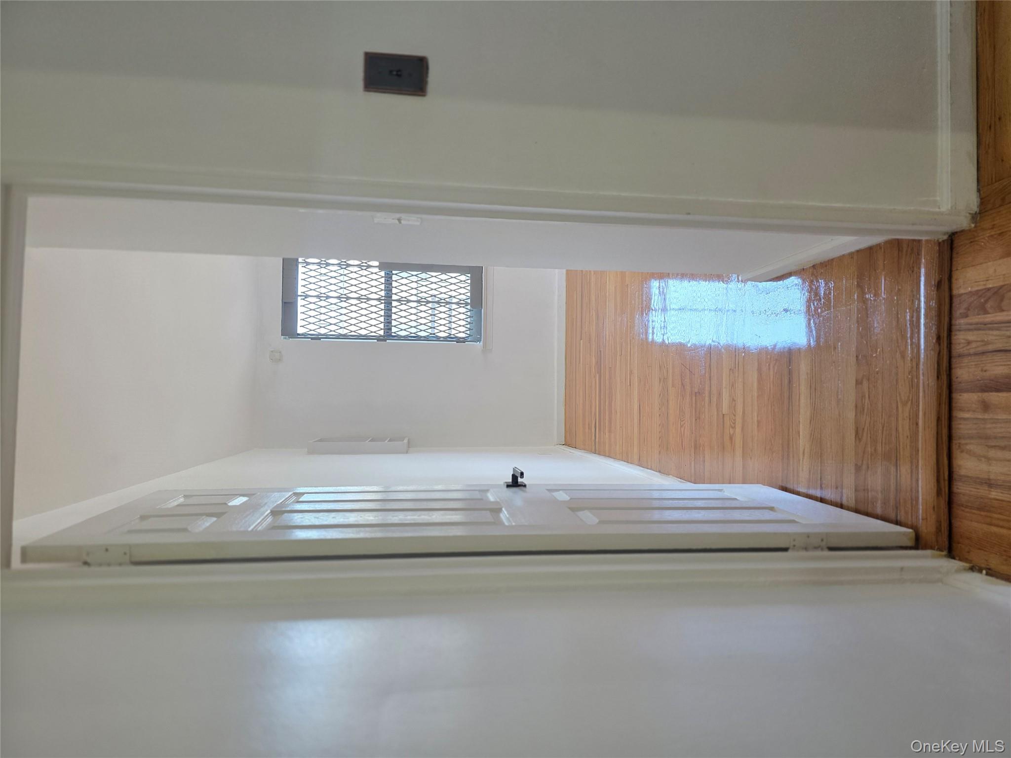 2640 Marion Avenue, Unit 6H Bronx, NY 10458 - Photo 7 of 14 a view of entryway with wooden floor
