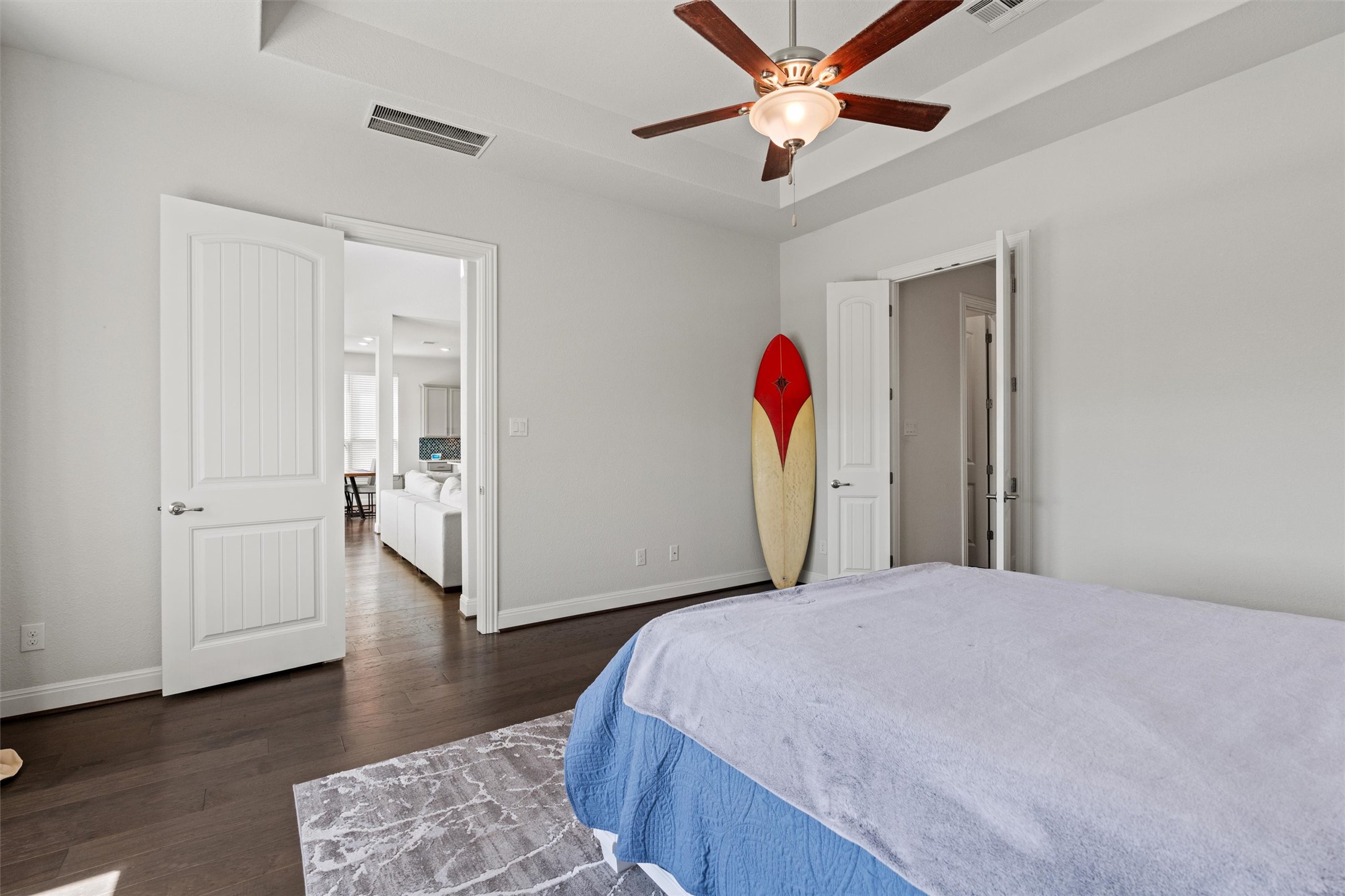 19325 Stembridge Run Pflugerville, TX 78660 - Photo 12 of 38 a spacious bedroom with a bed and a ceiling fan