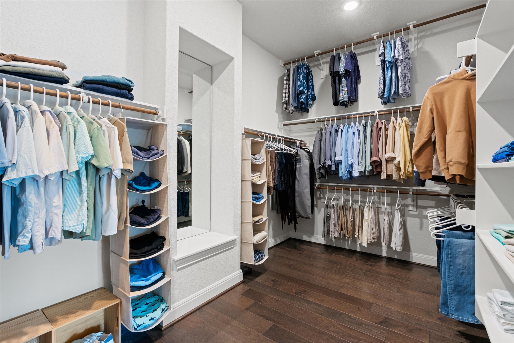 19325 Stembridge Run Pflugerville, TX 78660 - Photo 17 of 38 a view of walk in closet with clothes and shoes