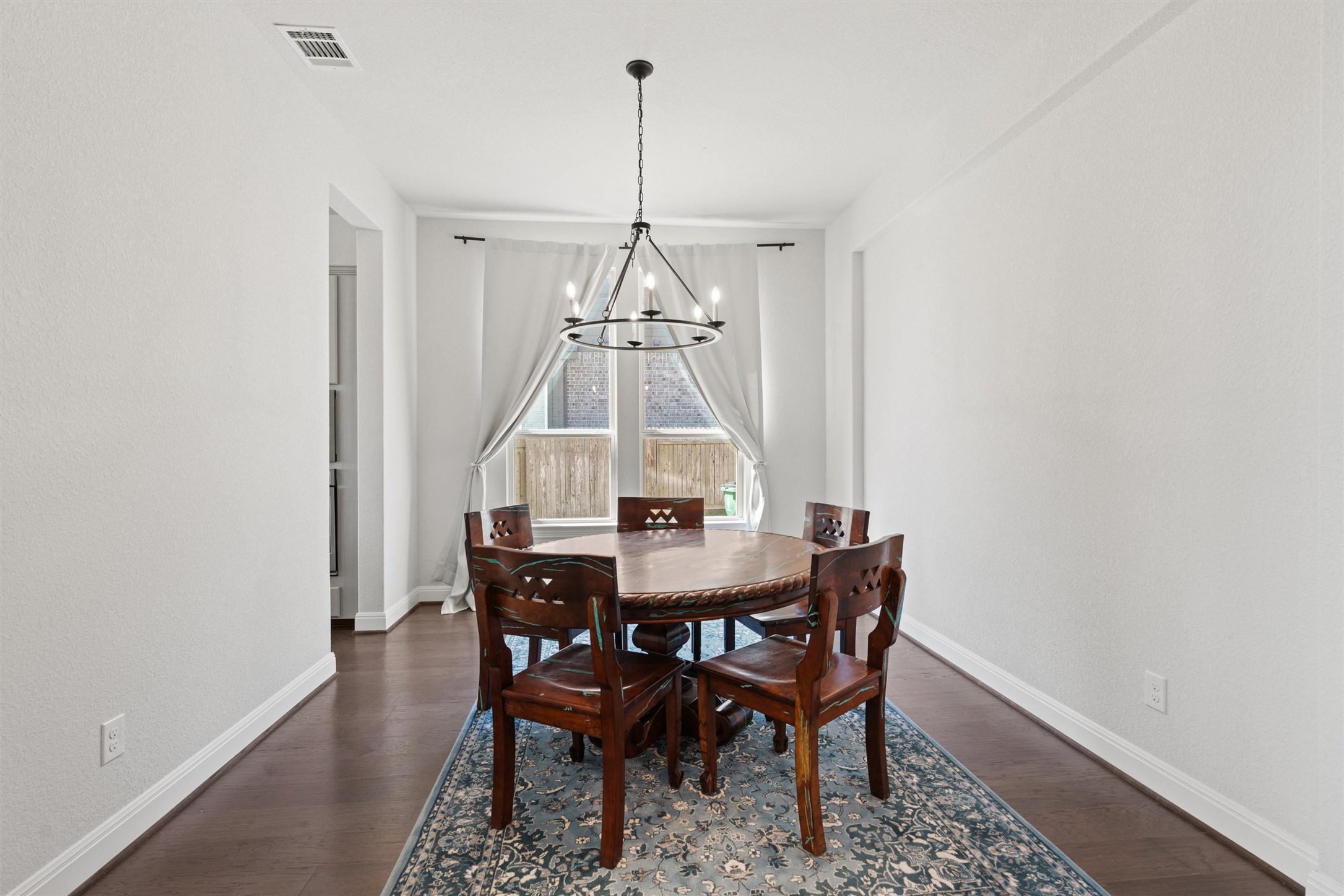 19325 Stembridge Run Pflugerville, TX 78660 - Photo 23 of 38 a view of a dining room with furniture