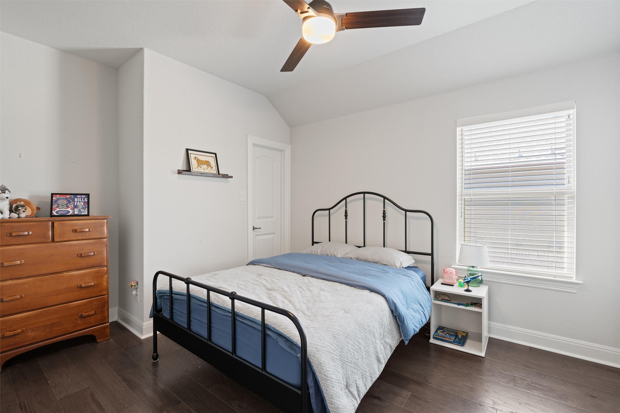 19325 Stembridge Run Pflugerville, TX 78660 - Photo 26 of 38 a bedroom with a bed and a window
