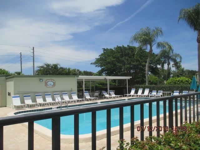 5423 Southeast Miles Grant Road, Unit F103 Stuart, FL 34997 - Photo 13 of 13 Community Pool