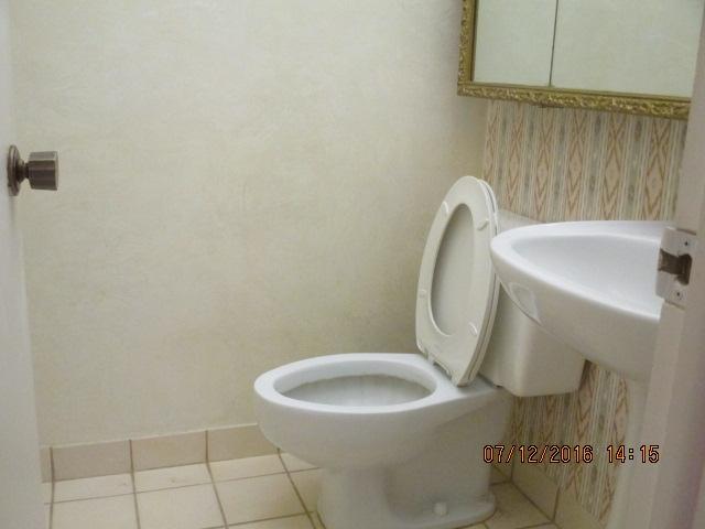 5423 Southeast Miles Grant Road, Unit F103 Stuart, FL 34997 - Photo 9 of 13 Half bath