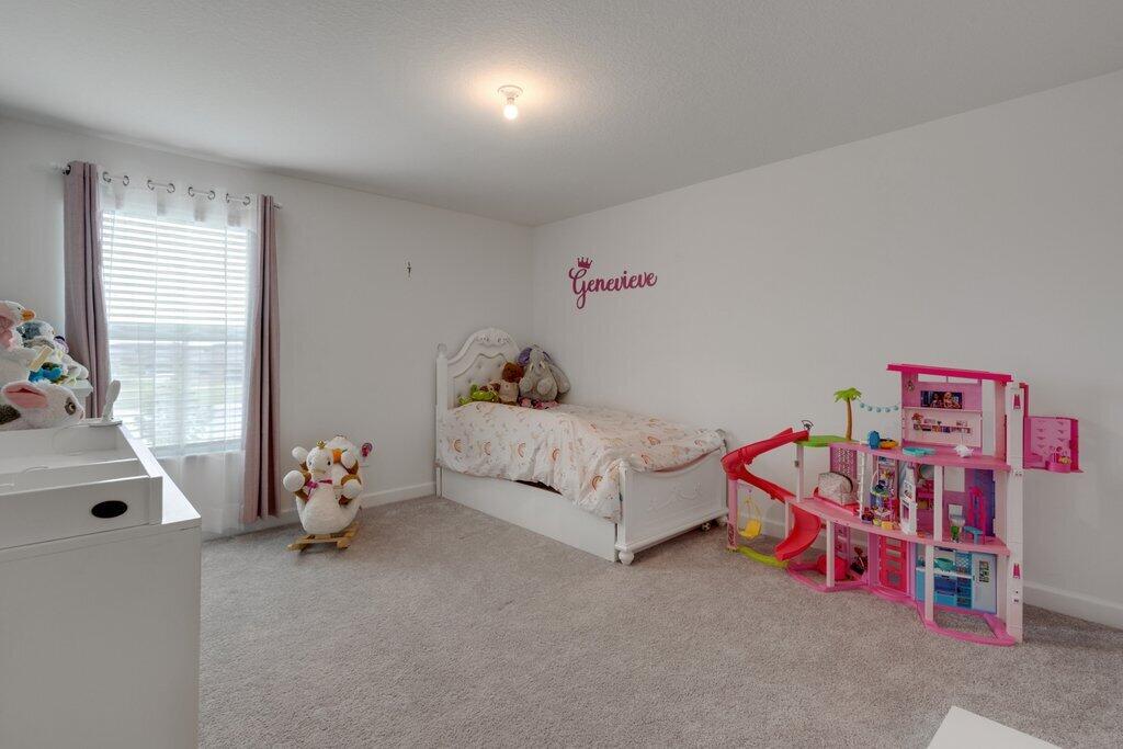 12328 Southwest Roma Circle Port St. Lucie, FL 34987 - Photo 45 of 72 Bedroom 2nd.jpeg-SMALL