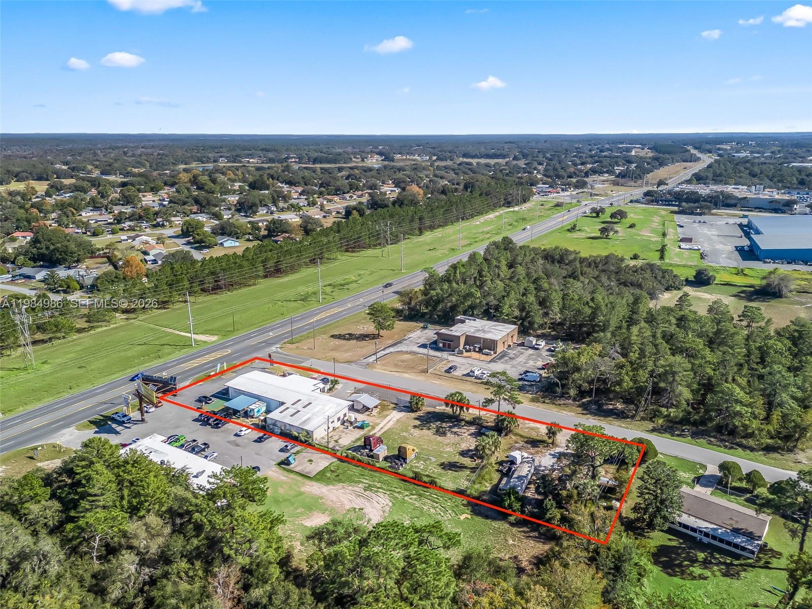 9594 Southeast Maricamp Road Ocala, FL 34472 - Photo 11 of 45 an aerial view of multiple house