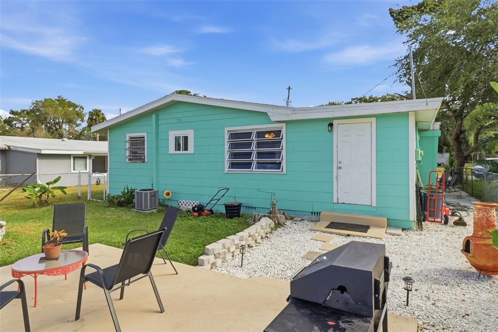 14235 Clamshell Lane Hudson, FL 34667 - Photo 21 of 25 a view of a house with backyard and sitting area