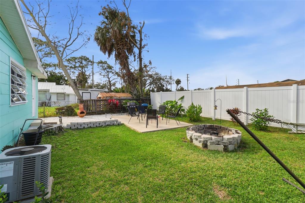 14235 Clamshell Lane Hudson, FL 34667 - Photo 23 of 25 a view of a house with backyard and sitting area
