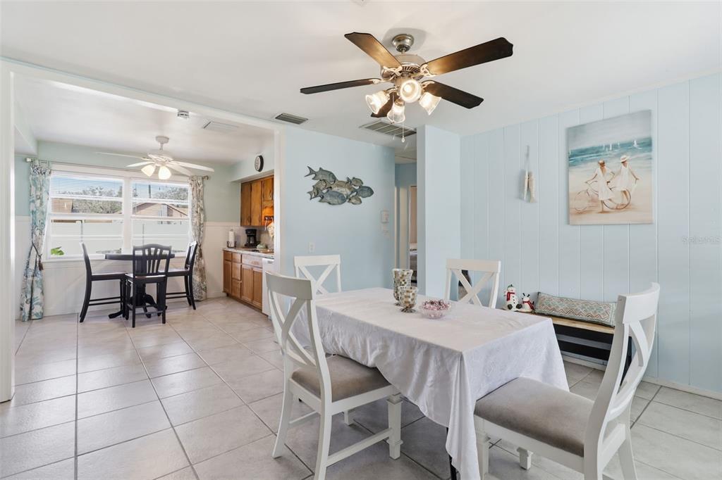 14235 Clamshell Lane Hudson, FL 34667 - Photo 5 of 25 a view of a dining room with furniture and chandelier