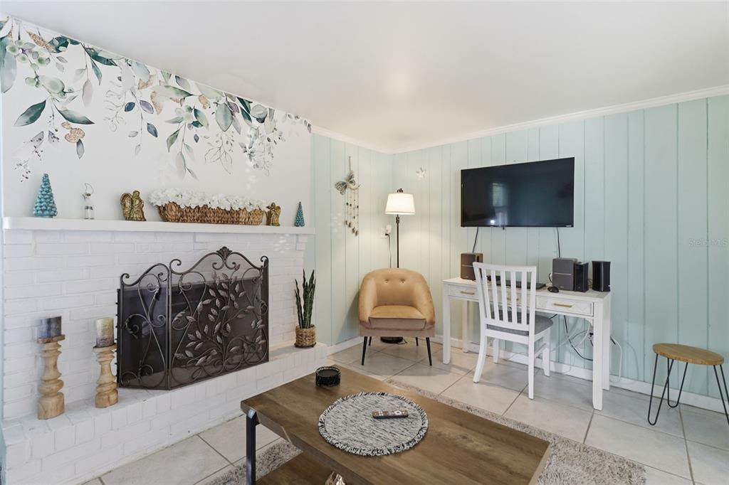 14235 Clamshell Lane Hudson, FL 34667 - Photo 7 of 25 a living room with furniture and a flat screen tv