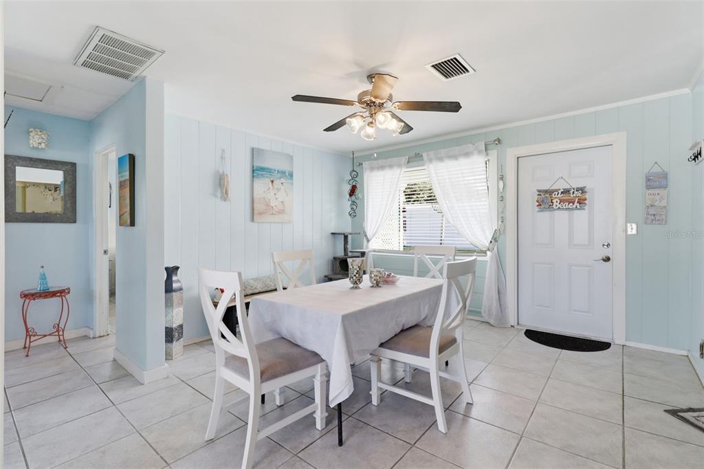 14235 Clamshell Lane Hudson, FL 34667 - Photo 9 of 25 a view of a dining room with furniture