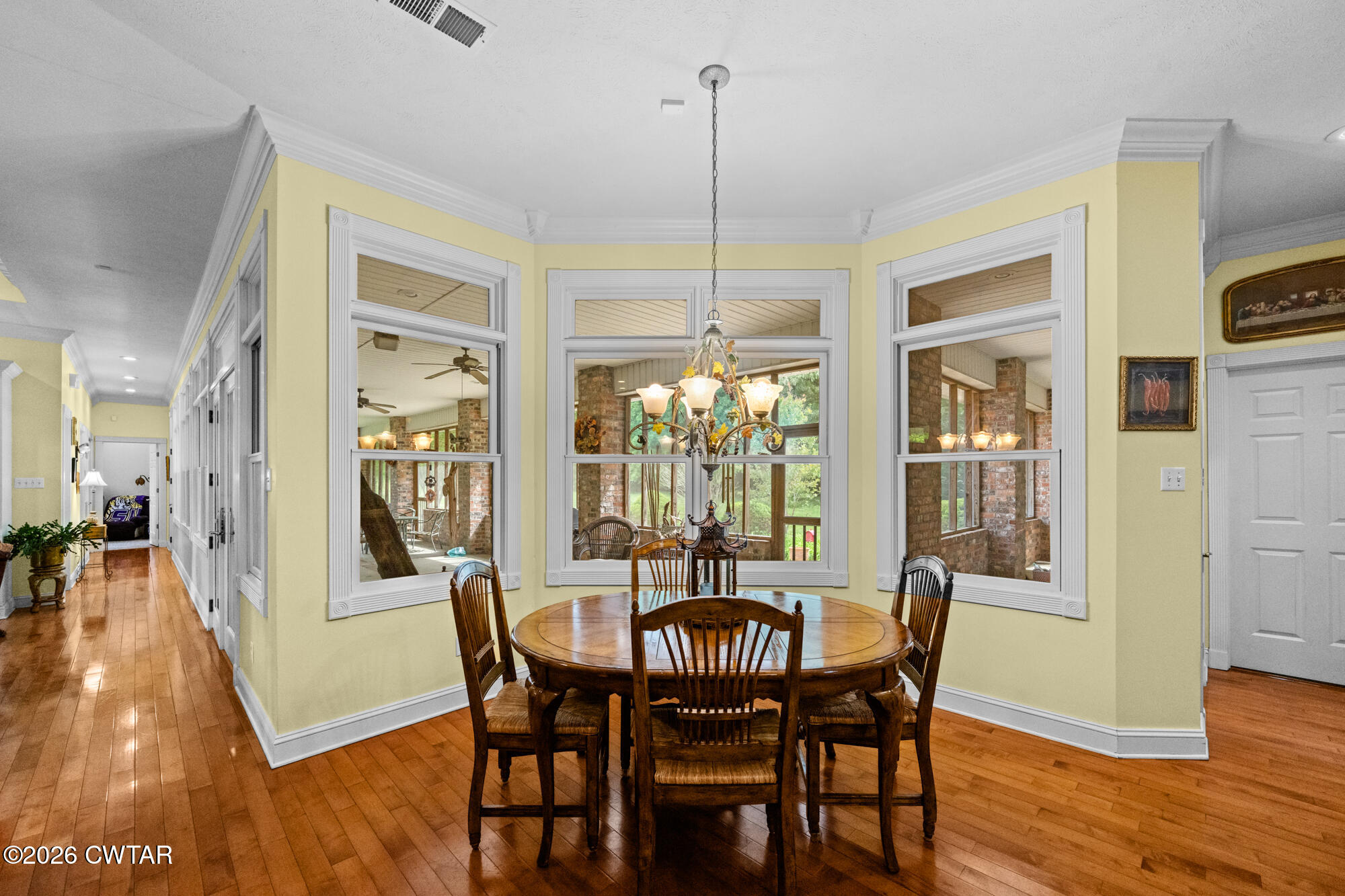 300 Harrison Road Dyersburg, TN 38024 - Photo 11 of 27 a view of a dining room with furniture window and wooden floor