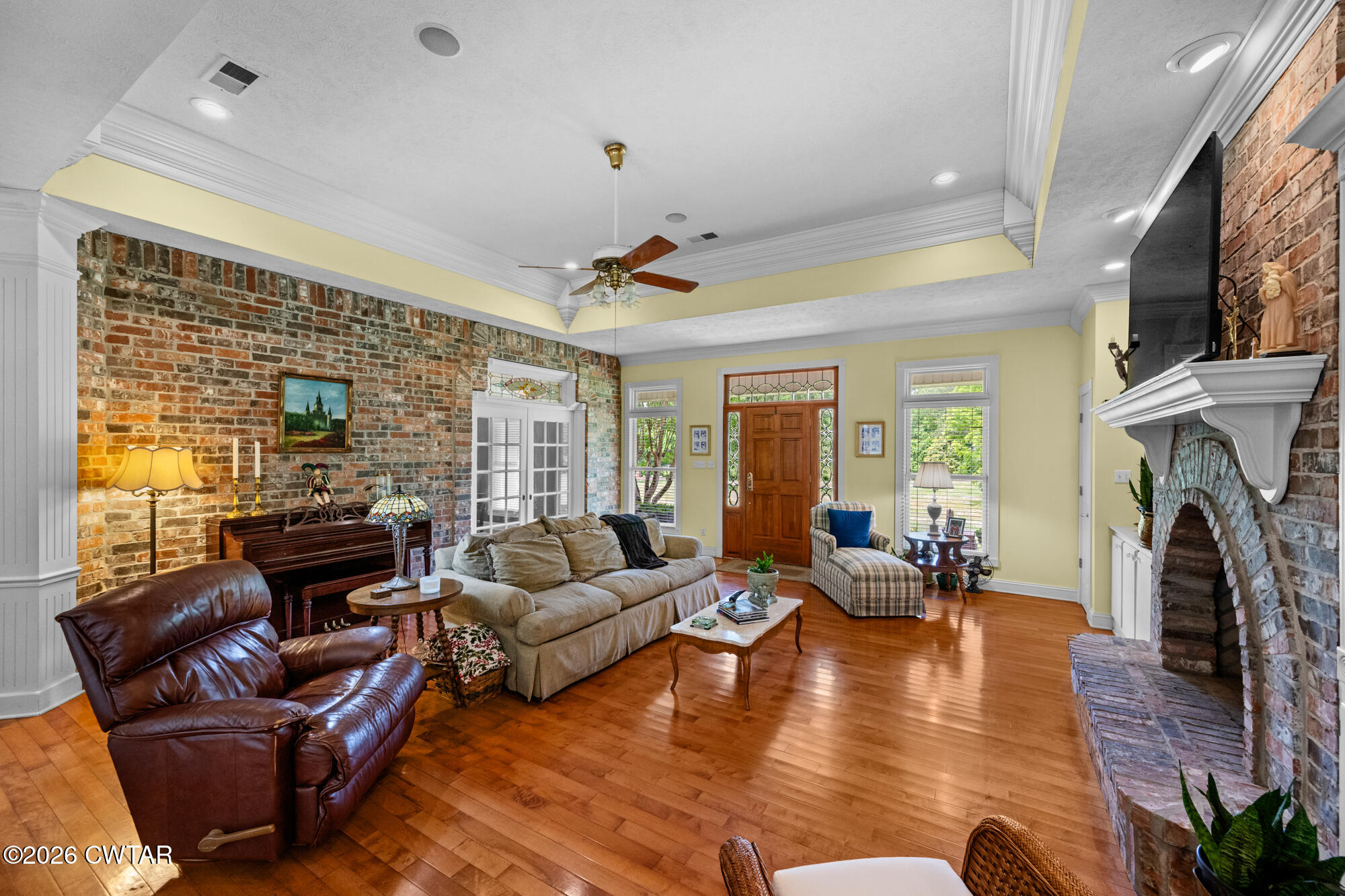 300 Harrison Road Dyersburg, TN 38024 - Photo 14 of 27 a living room with fireplace furniture and a fireplace
