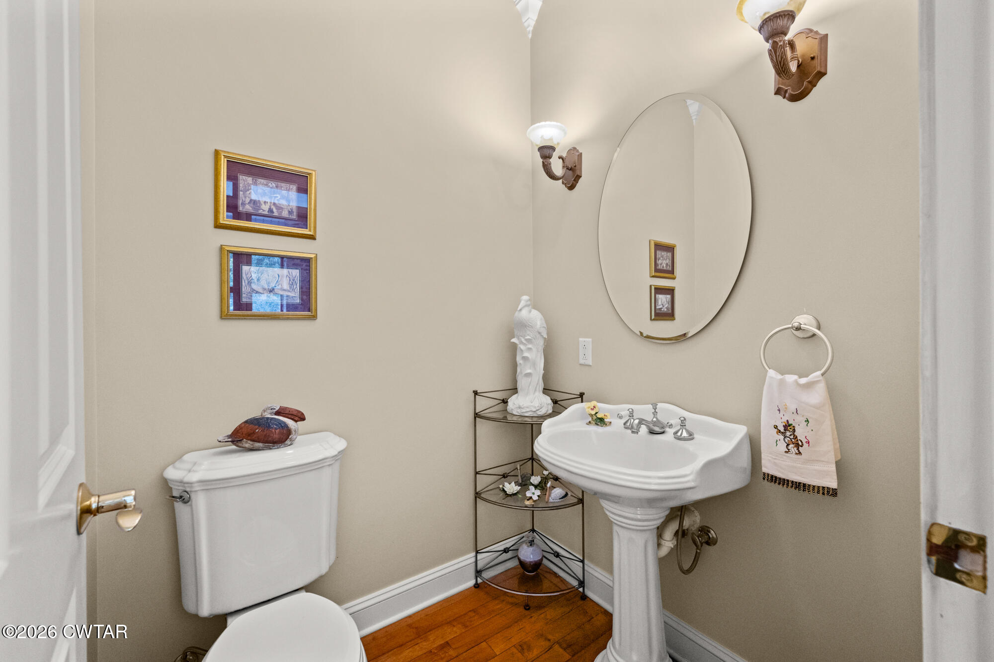 300 Harrison Road Dyersburg, TN 38024 - Photo 17 of 27 a bathroom with a sink mirror and toilet