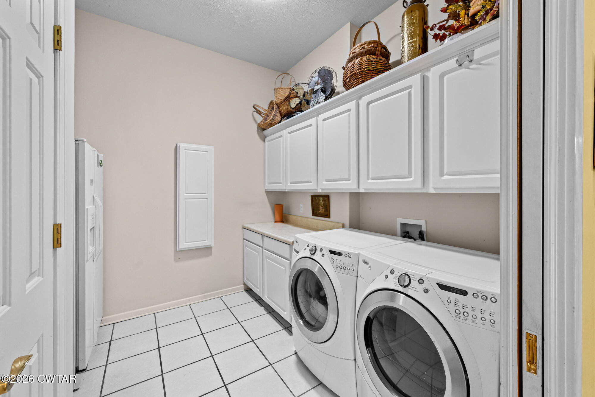 300 Harrison Road Dyersburg, TN 38024 - Photo 18 of 27 a utility room with dryer and washer