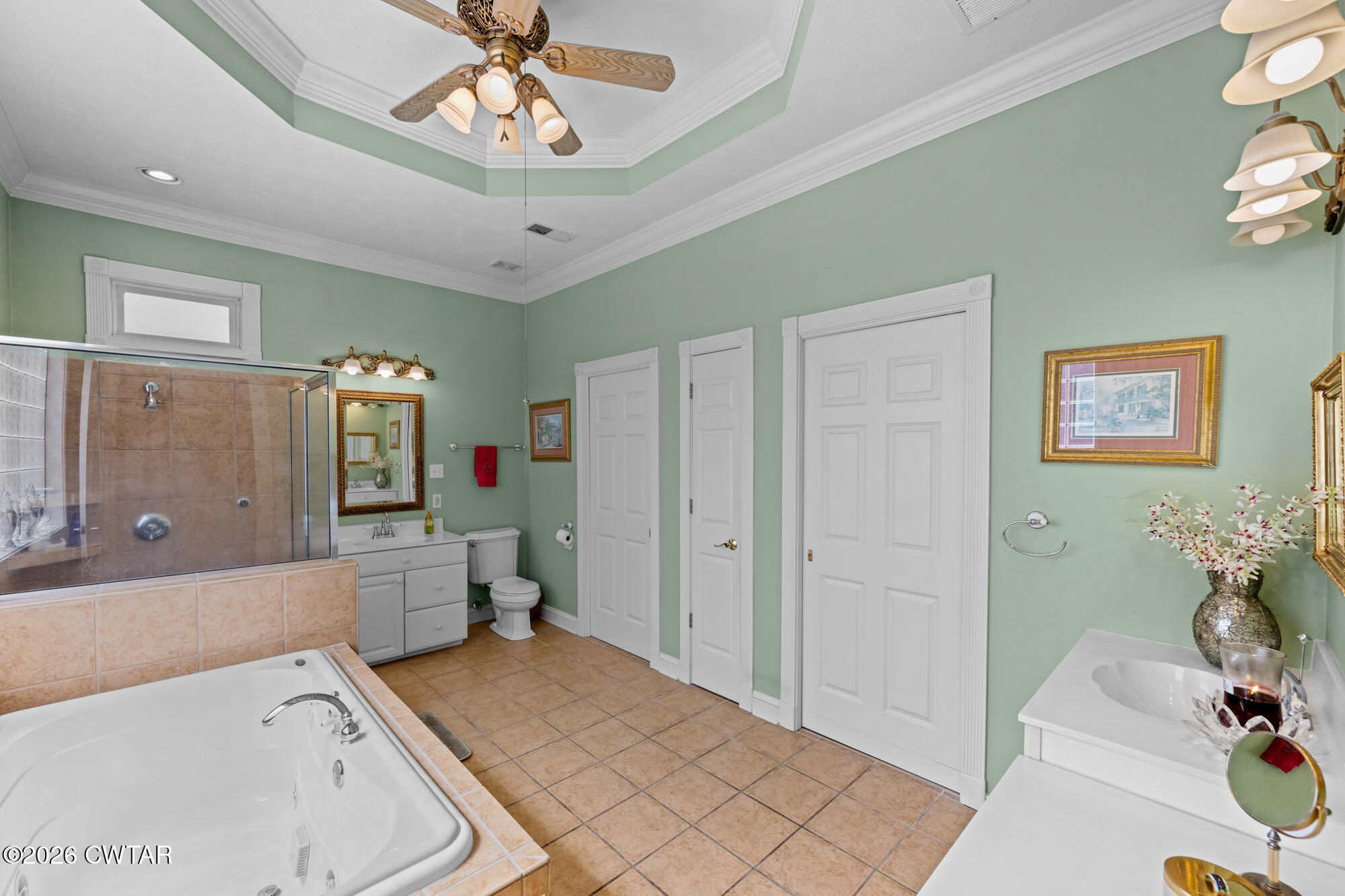 300 Harrison Road Dyersburg, TN 38024 - Photo 22 of 27 a spacious bathroom with a tub shower and sink