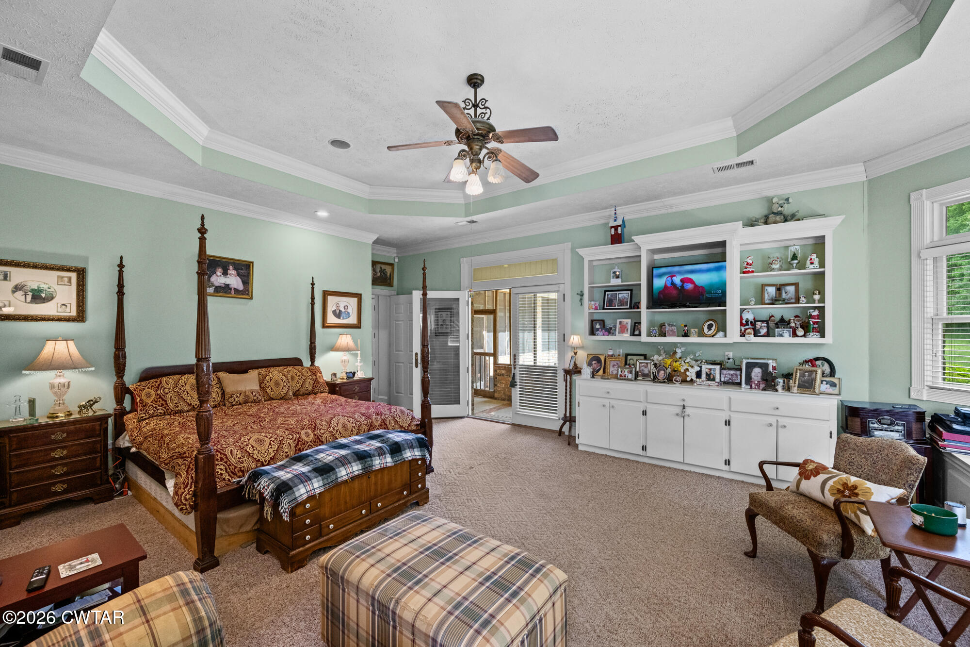 300 Harrison Road Dyersburg, TN 38024 - Photo 23 of 27 a bedroom with a bed furniture and flat screen tv