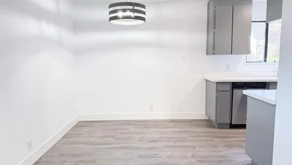 a view of kitchen and sink