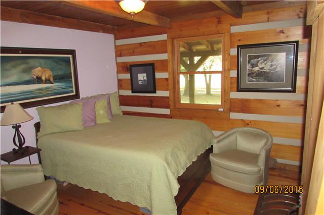 6169 Red River School Road Portland, TN 37148 - Photo 11 of 20 a bedroom with furniture and a window