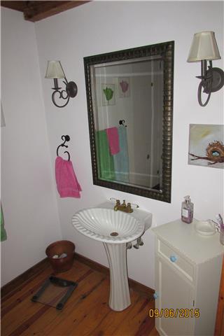 6169 Red River School Road Portland, TN 37148 - Photo 12 of 20 a bathroom with a sink and mirror