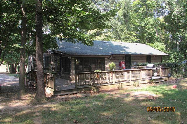 6169 Red River School Road Portland, TN 37148 - Photo 20 of 20 a view of a house with a yard and sitting area