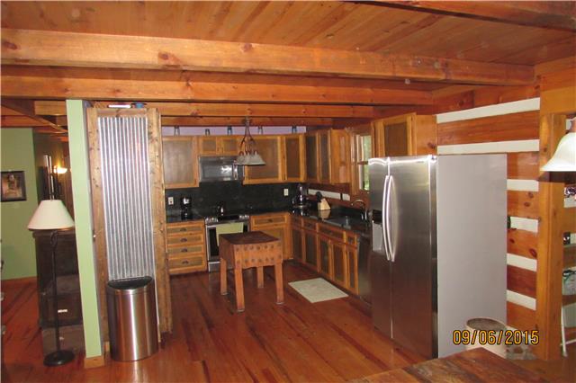 6169 Red River School Road Portland, TN 37148 - Photo 3 of 20 a dining room with furniture and wooden floor