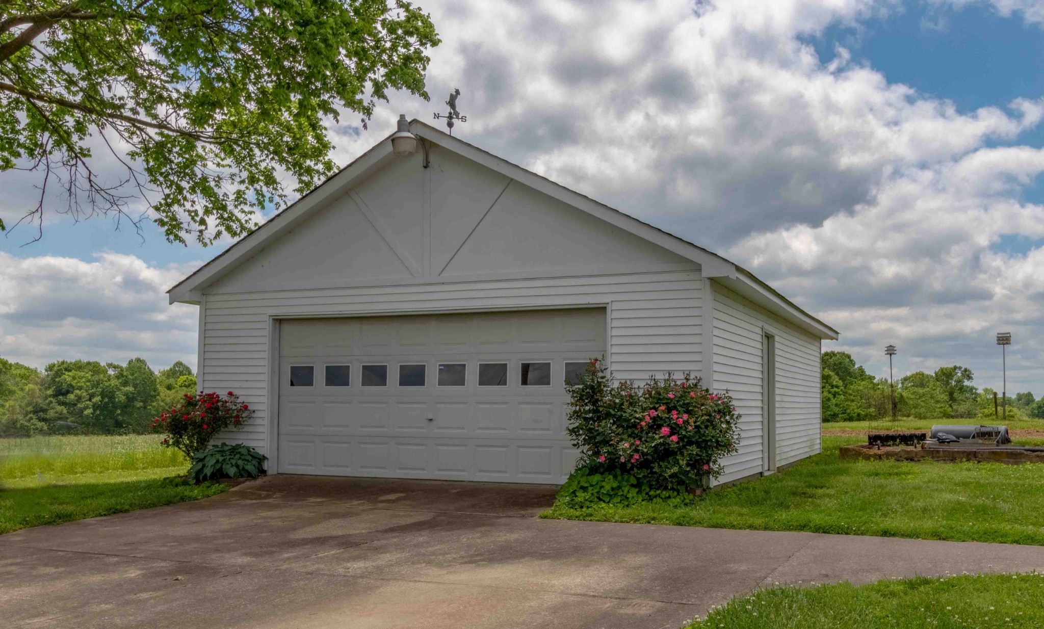 1780 Hickory Point Road Clarksville, TN 37043 - Photo 14 of 50 a front view of a house with a garden