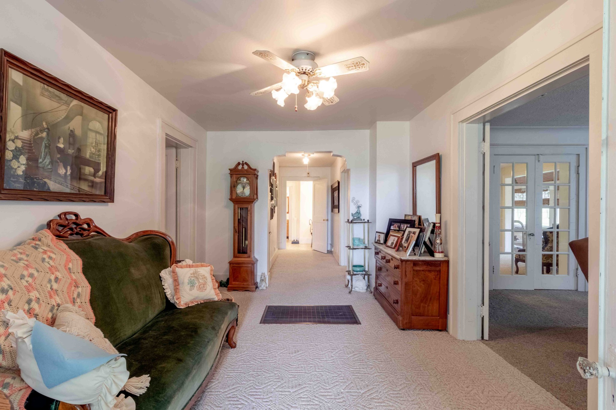 1780 Hickory Point Road Clarksville, TN 37043 - Photo 25 of 50 a living room with furniture and a chandelier