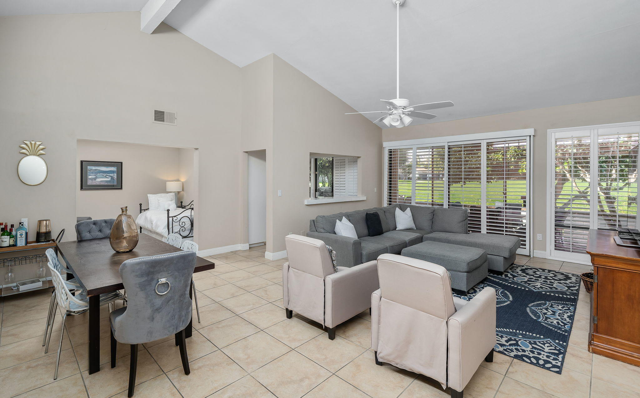 28 Palomas Drive Rancho Mirage, CA 92270 - Photo 1 of 26 a living room with furniture and a chandelier