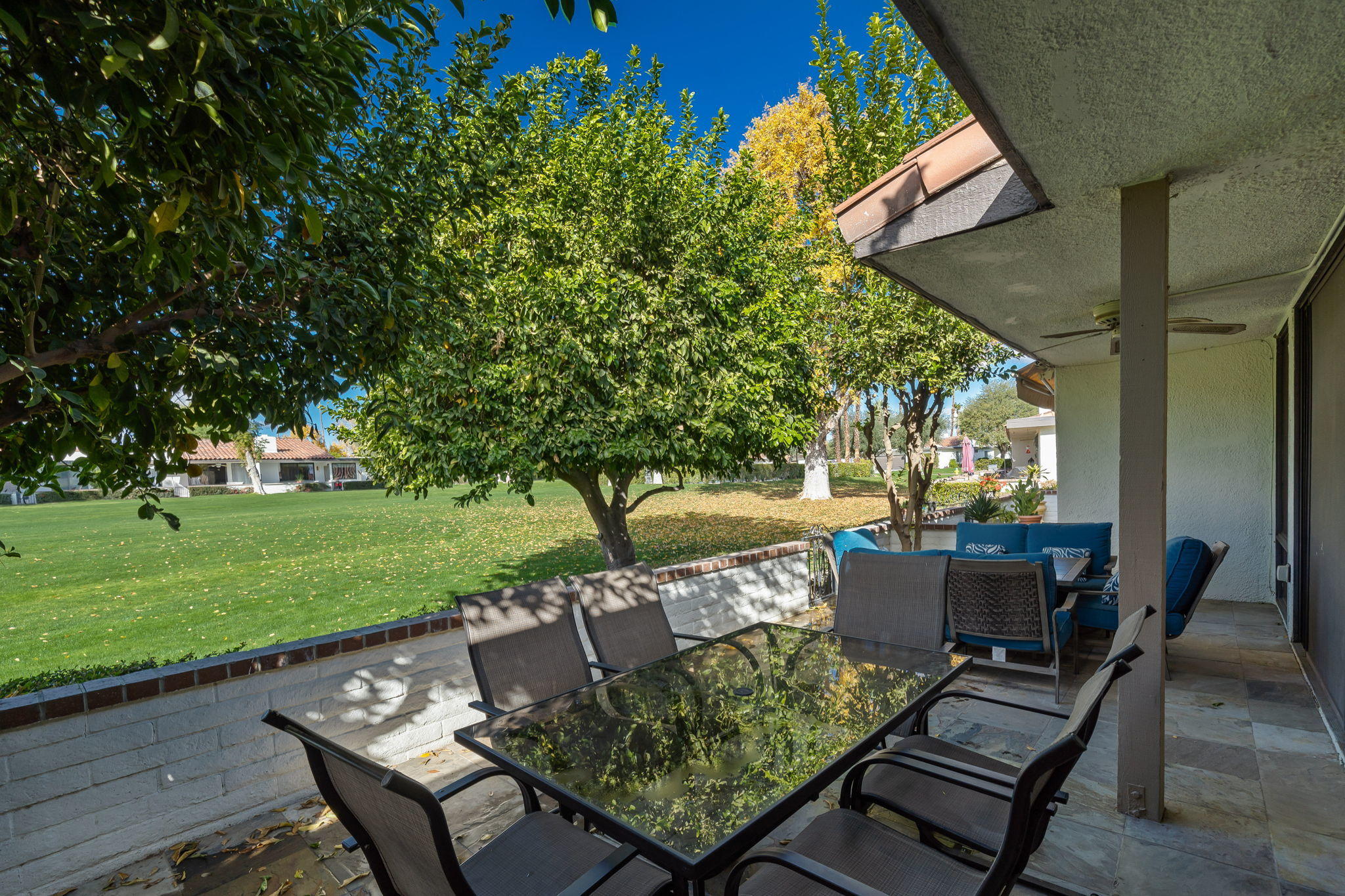 28 Palomas Drive Rancho Mirage, CA 92270 - Photo 14 of 26 a view of a couches and a table in the patio