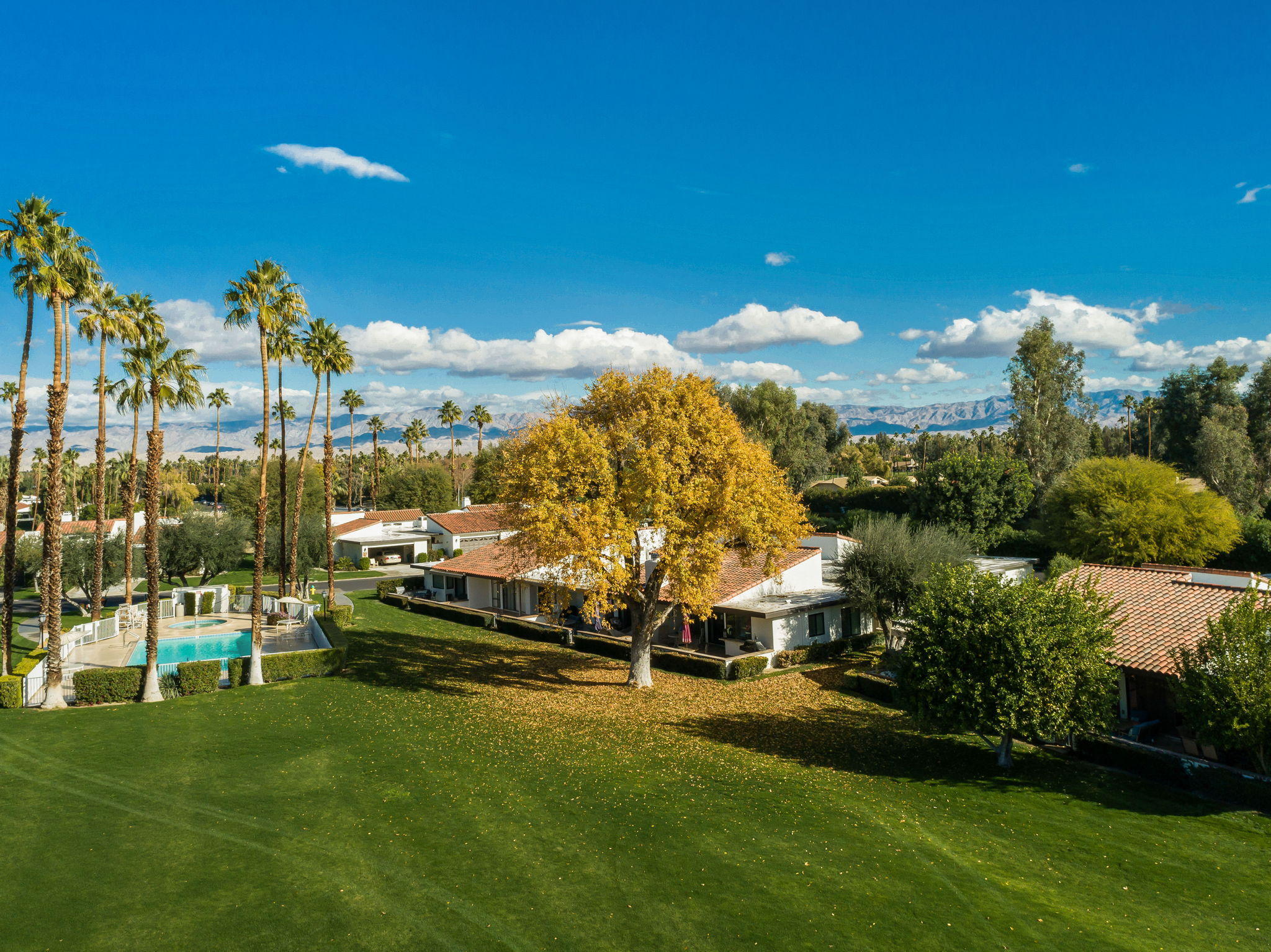 28 Palomas Drive Rancho Mirage, CA 92270 - Photo 20 of 26 a view of a lake with a big yard