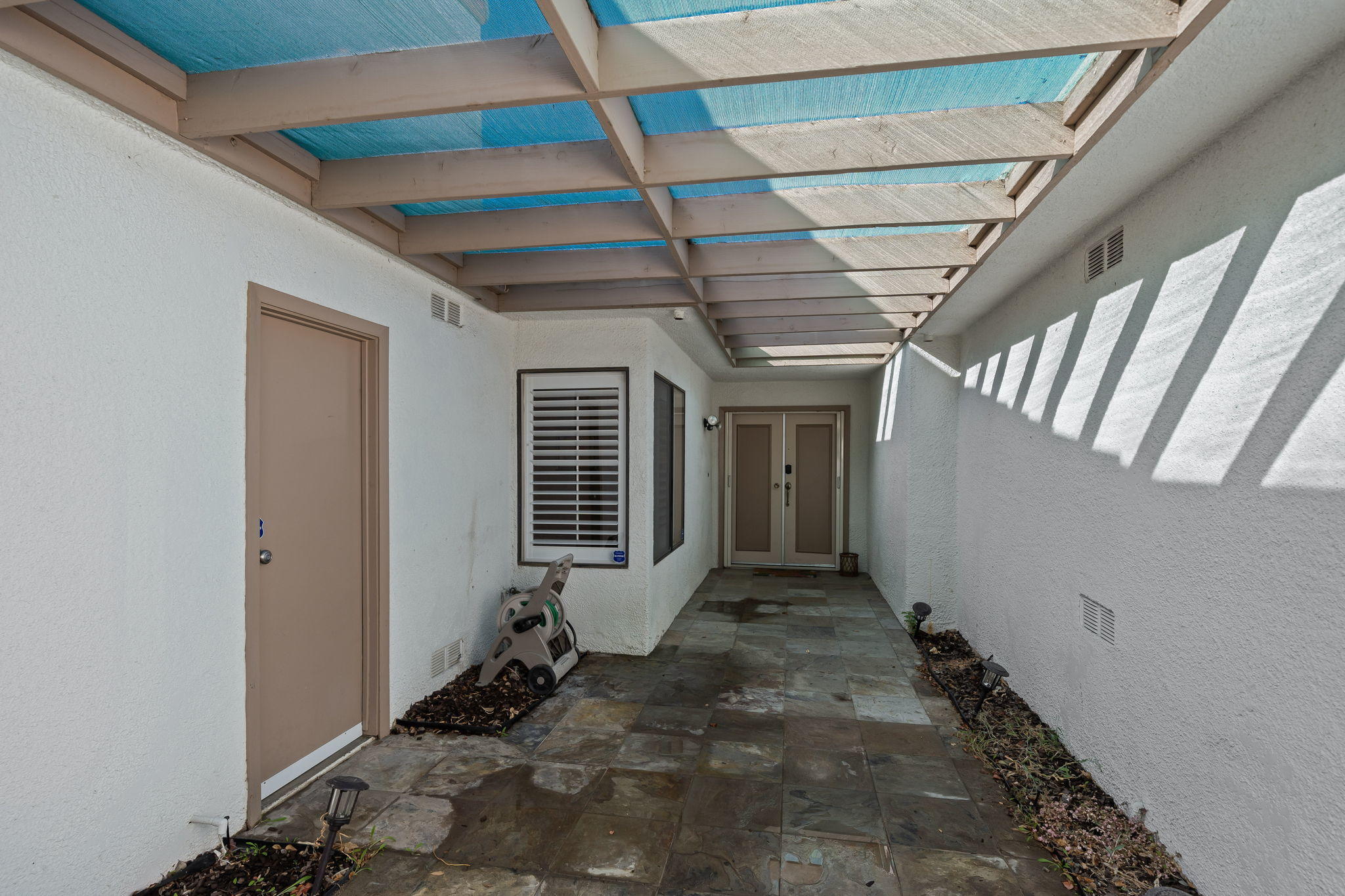 28 Palomas Drive Rancho Mirage, CA 92270 - Photo 4 of 26 a view of a room with wooden walls
